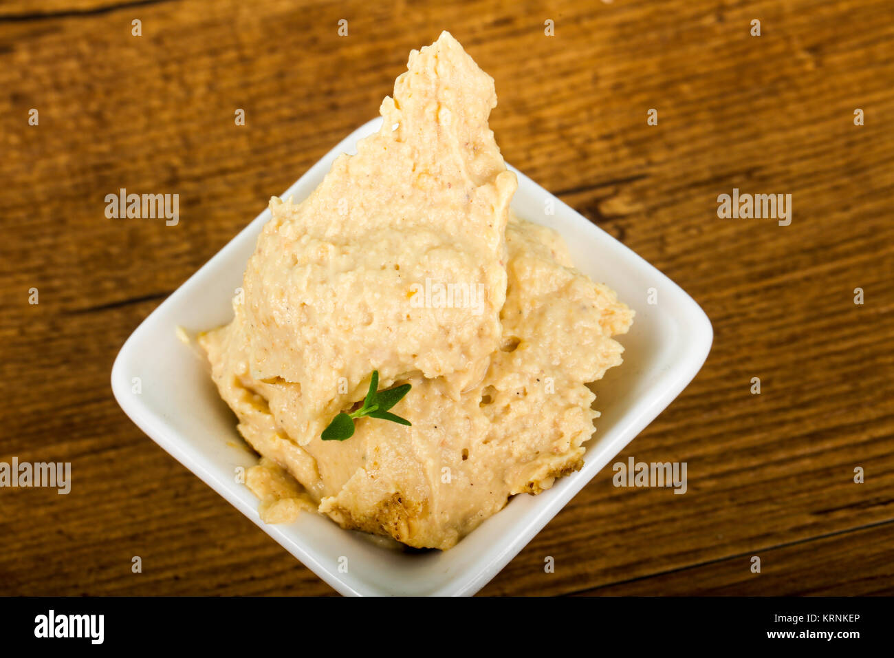 Vegetarian Humus with sesame seeds and thyme leaves Stock Photo Alamy