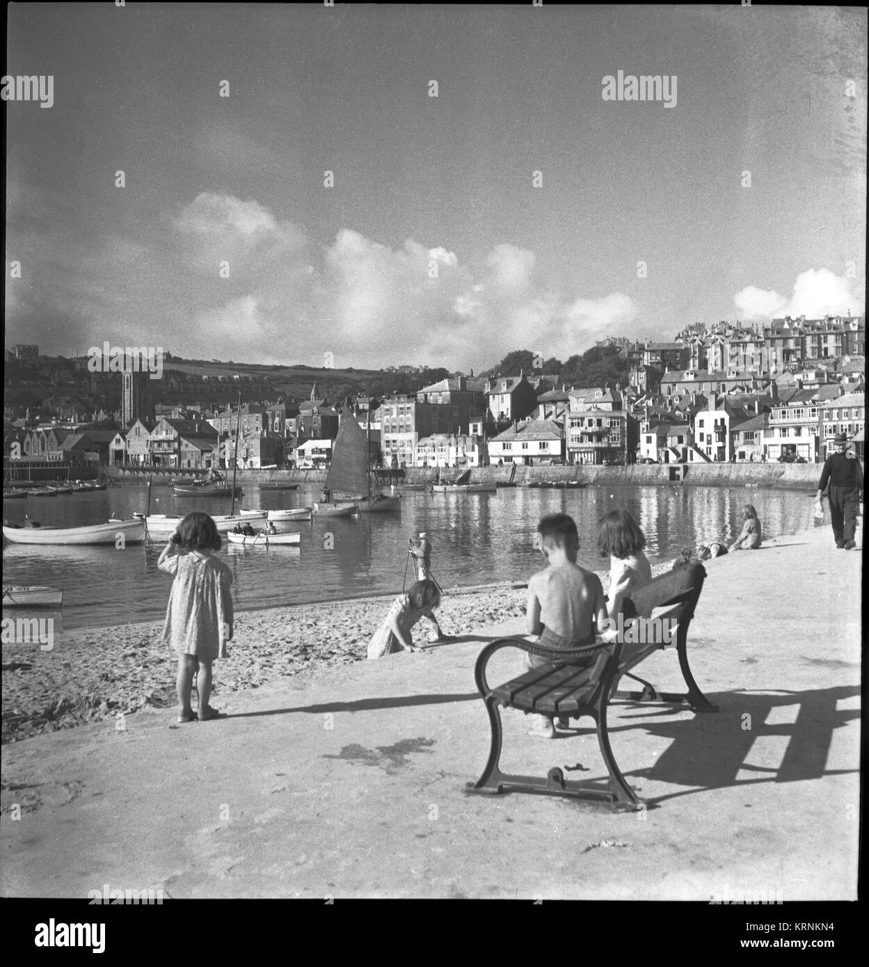 Gilbert St Ines A view of St Ives seafront with children playing in the foreground ...