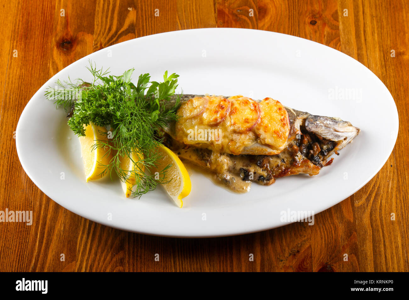 Stuffed trout with mushrooms and sauce Stock Photo Alamy