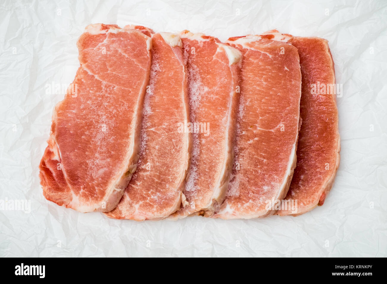 Frozen meat steaks Stock Photo Alamy