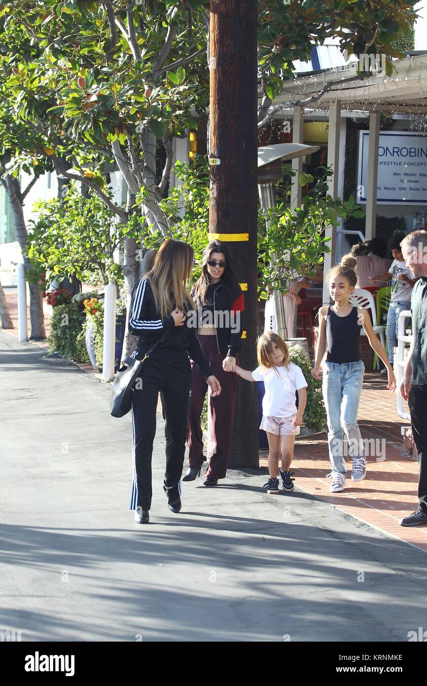 Kourtney Kardashian shopping with her daughter, Penelope, and Larsa