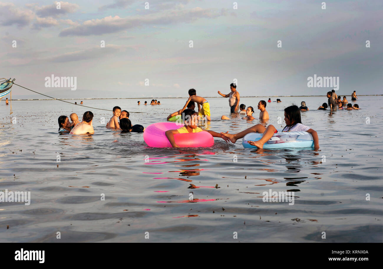 BALI LOCALS FAMILY SWIMMING Stock Photo Alamy