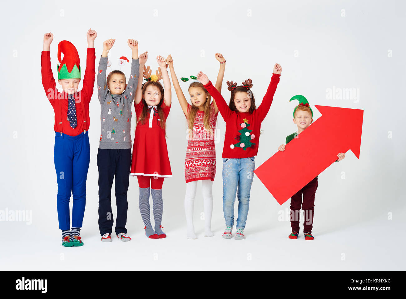 Cheerful group of children in christmas costume Stock Photo