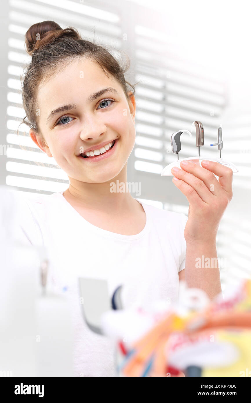 hearing aids. hearing aid behind the ear. Stock Photo