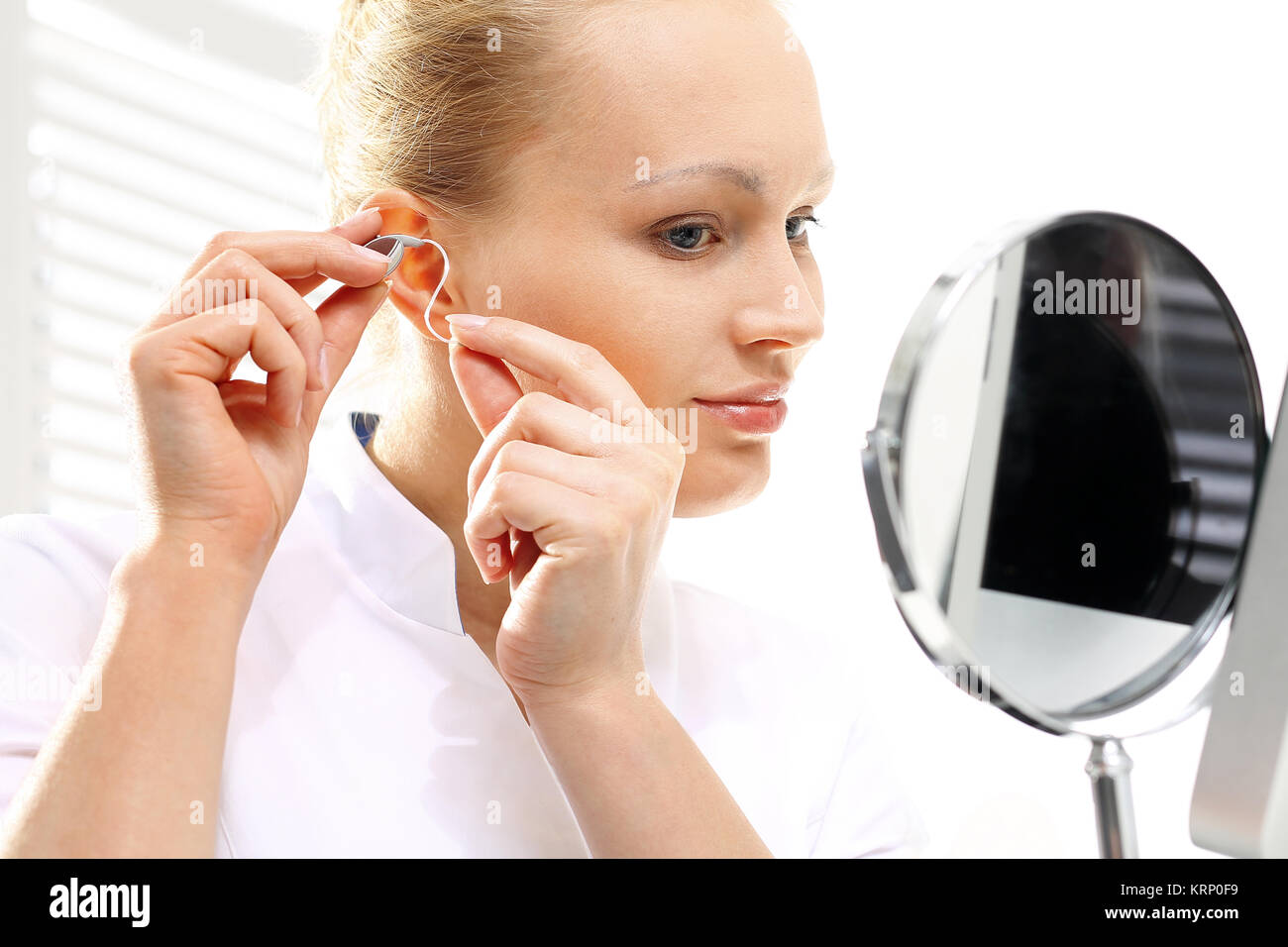 hearing loss. hearing. hearing aid. Stock Photo