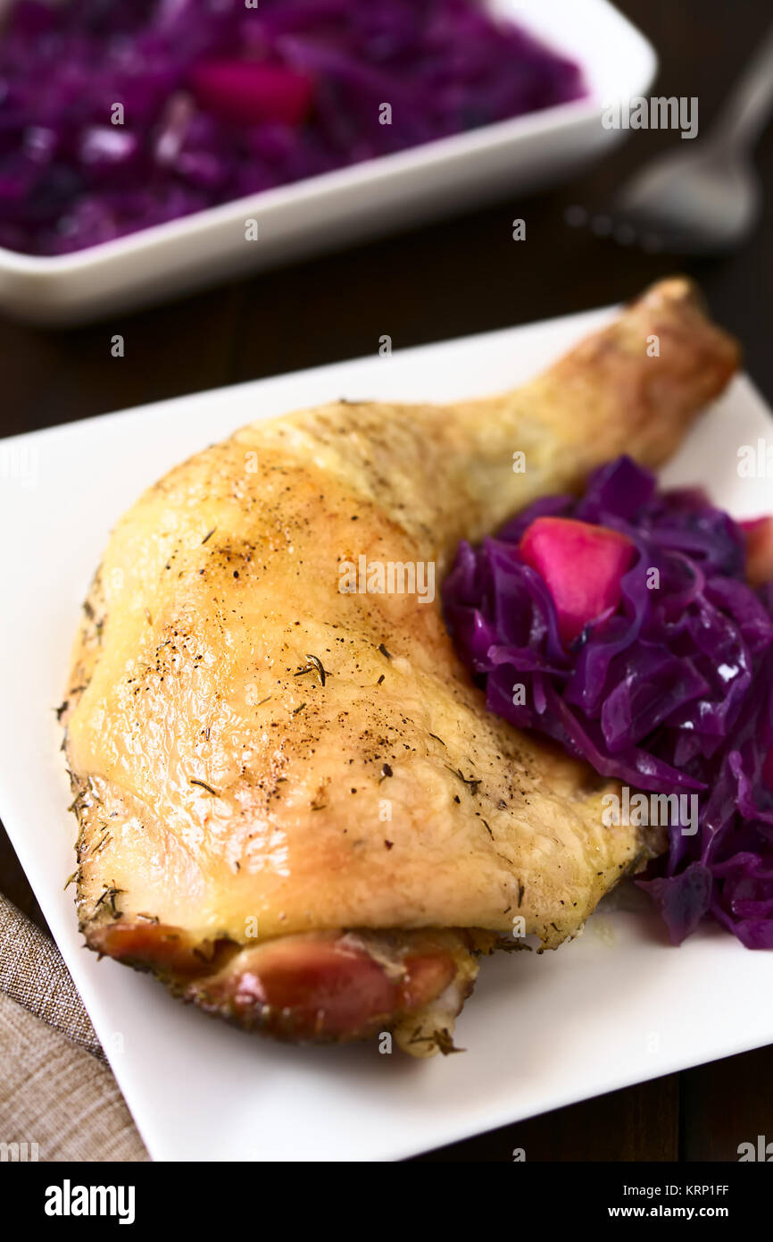 Roasted Chicken Thigh with Braised Red Cabbage Stock Photo Alamy