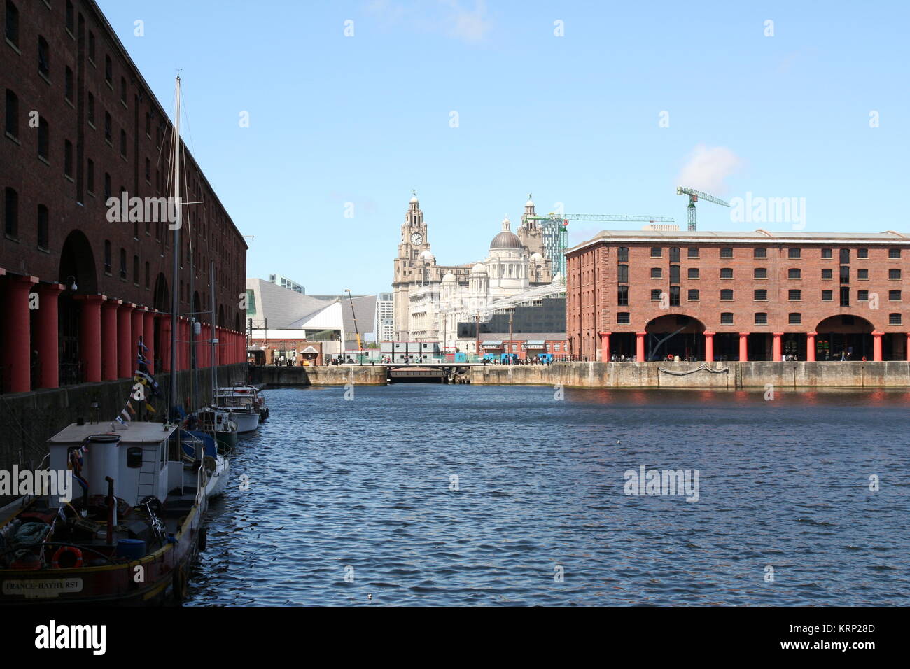 Albert Dock, Liverpool, Three Graces in background. Stock Photo