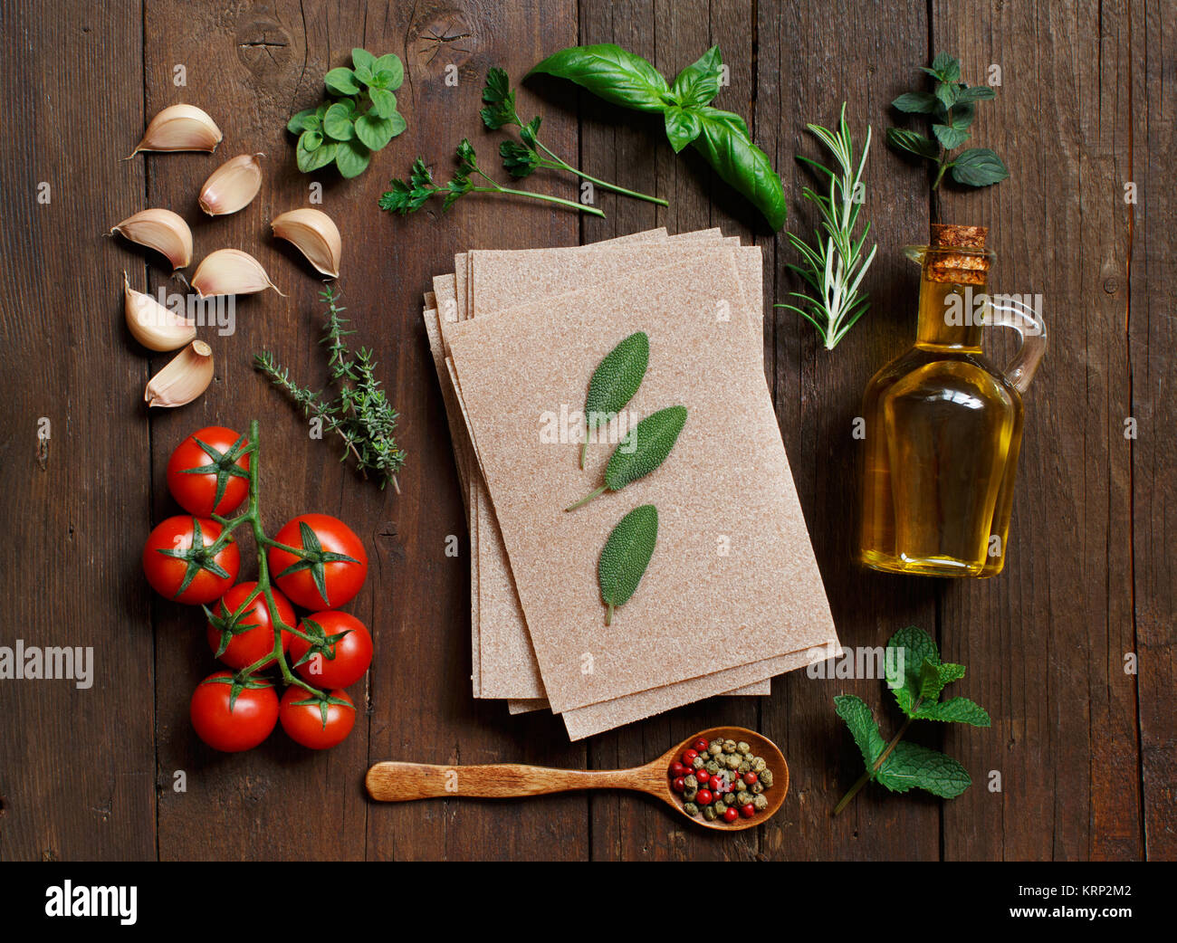 Whole wheat lasagna sheets, vegetables and herbs Stock Photo