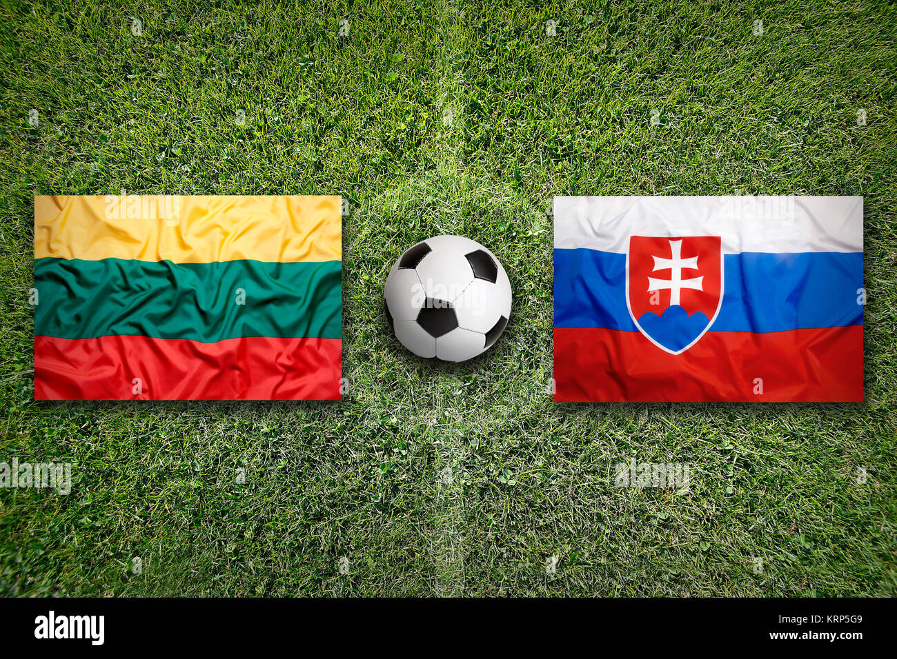 Lithuania vs. Slovakia flags on soccer field Stock Photo - Alamy
