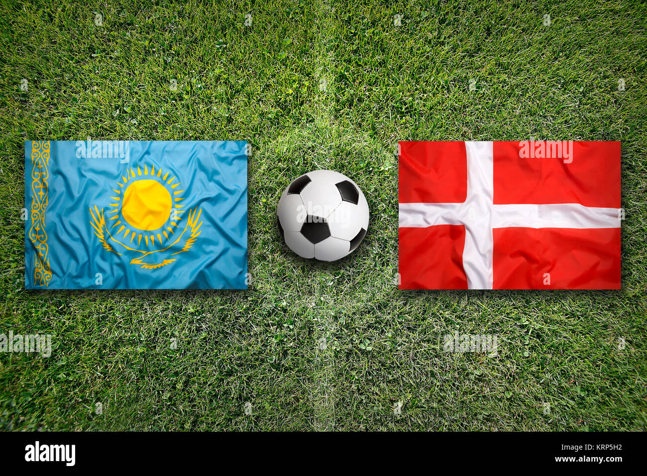 Kazakhstan vs. Denmark flags on soccer field Stock Photo Alamy Kazakhstan vs. Denmark flags on soccer field Stock Photo Alamy
