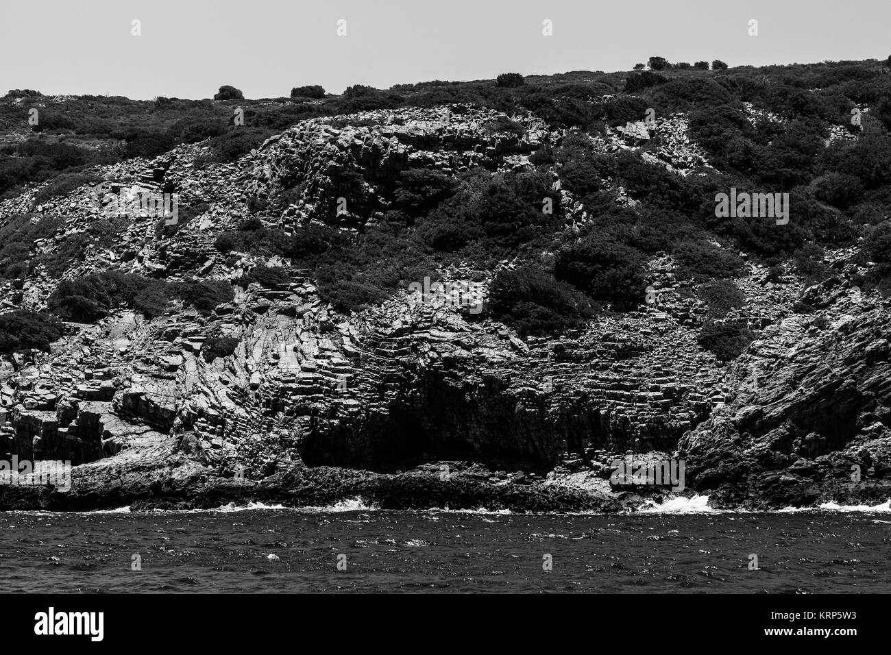 Mediterranean Sea. Crete. Greece. The cliffs of the peninsula of Kalydon. Black and white. Stock Photo