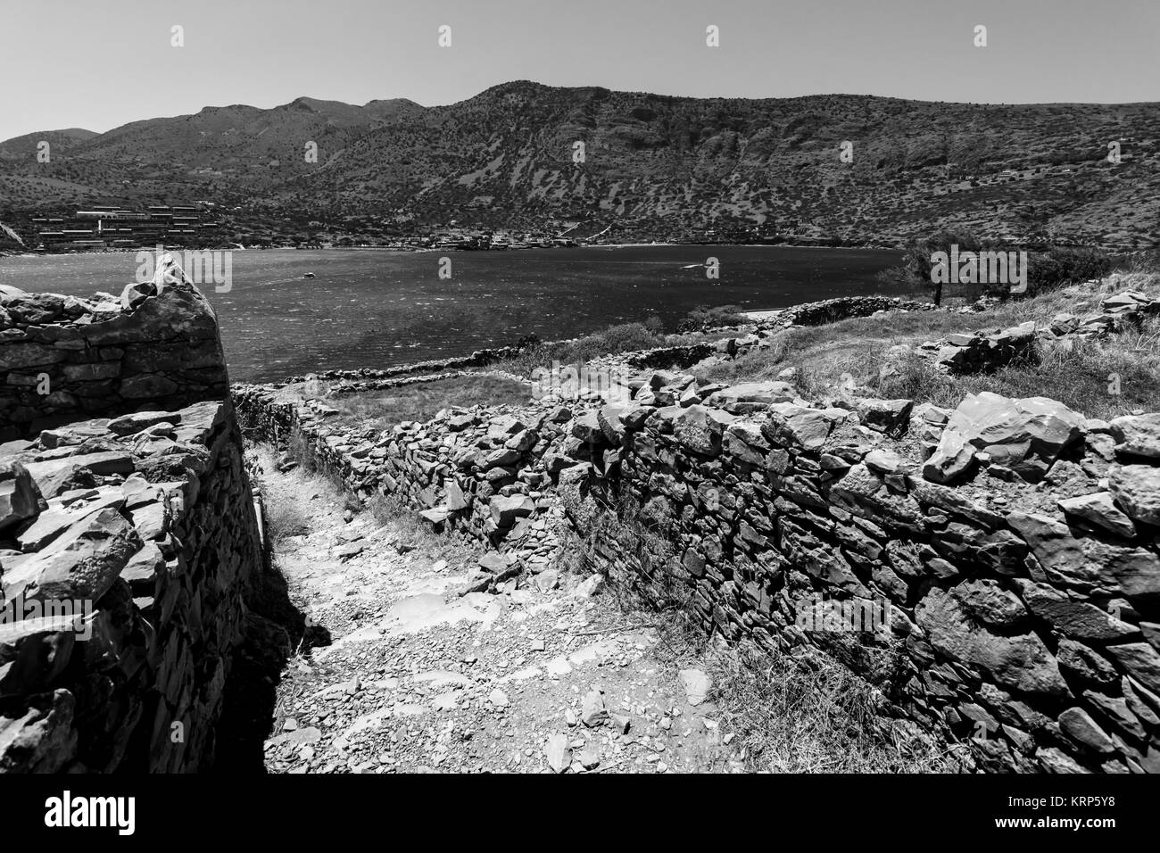 View of the Gulf of Elounda from a fortress on Spinalonga island. Black and white. Stock Photo