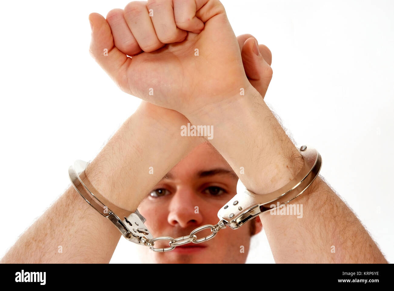Mann in Handschellen - man in handcuffs Stock Photo