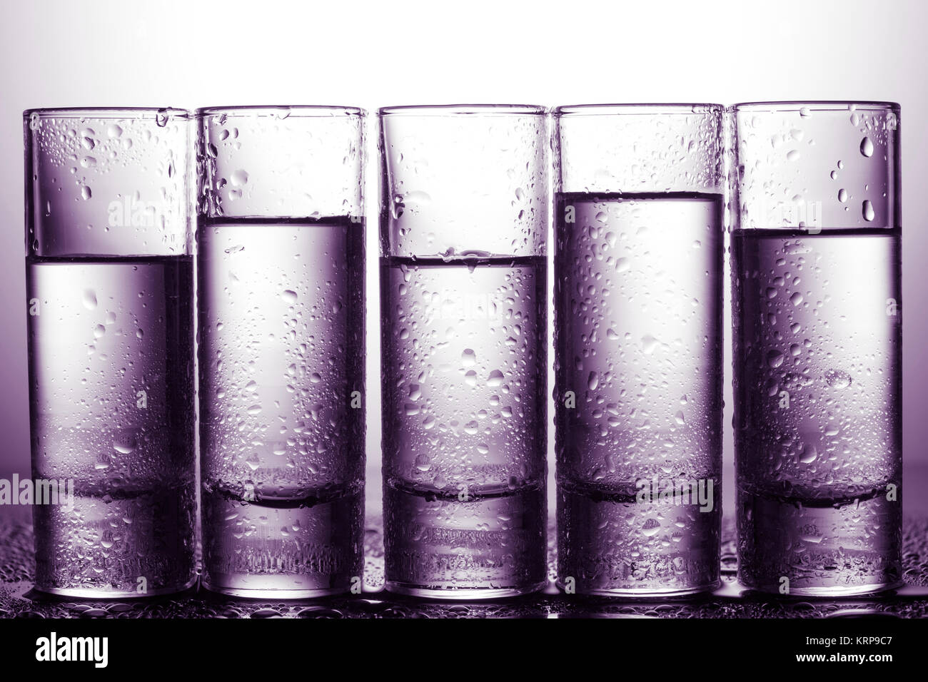 row of glasses for vodka Stock Photo