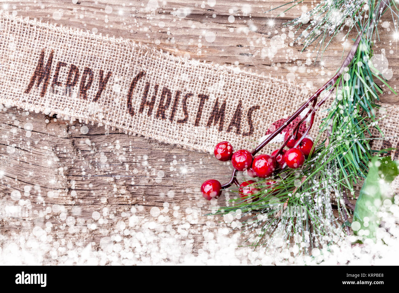 Christmas ribbon on wooden background Stock Photo