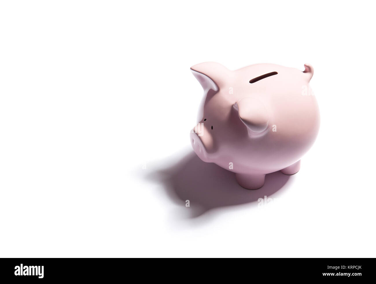 Pink piggy bank on white background Stock Photo - Alamy