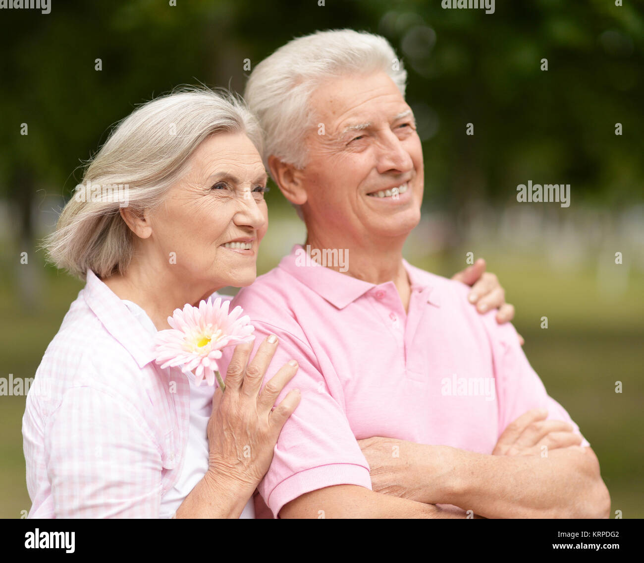 beautiful caucasian senior couple in the park Stock Photo - Alamy