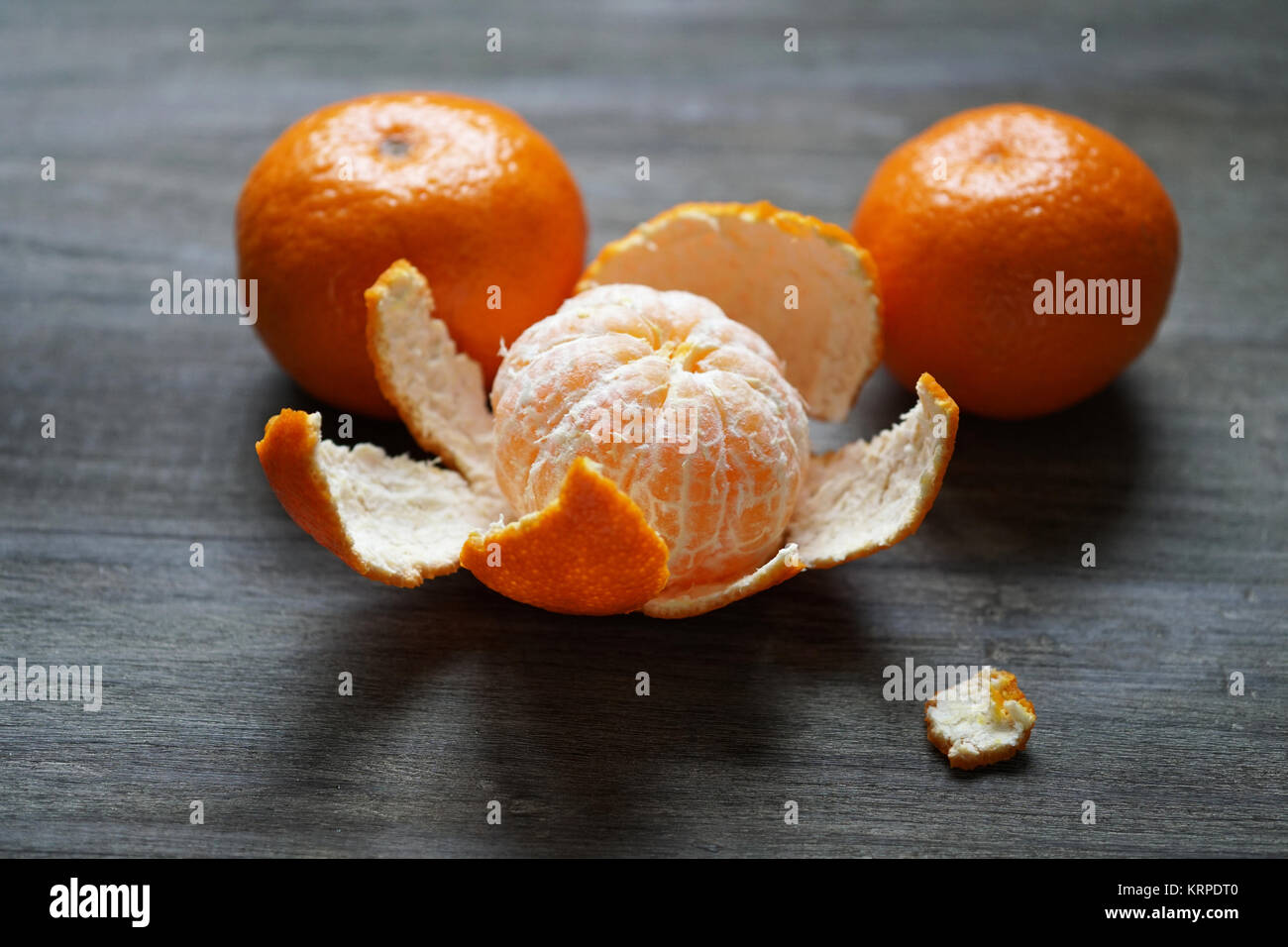 clementines or mandarin oranges on rustic wooden table Stock Photo Alamy
