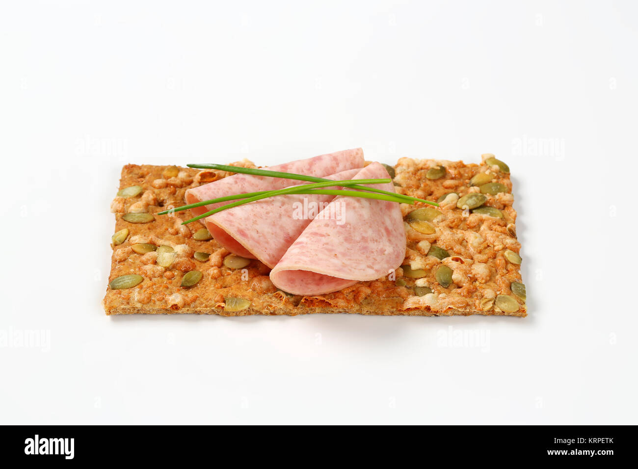 pumpkin seed cracker with deli meat Stock Photo Alamy