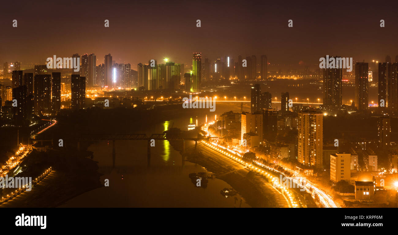 Aerial night view panorama of Han river between Hankou and Hanyang districts in Wuhan central China Stock Photo