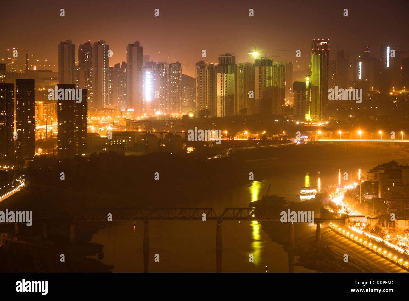 Aerial night view cityscape of Han river between Hankou and Hanyang districts in Wuhan central China Stock Photo