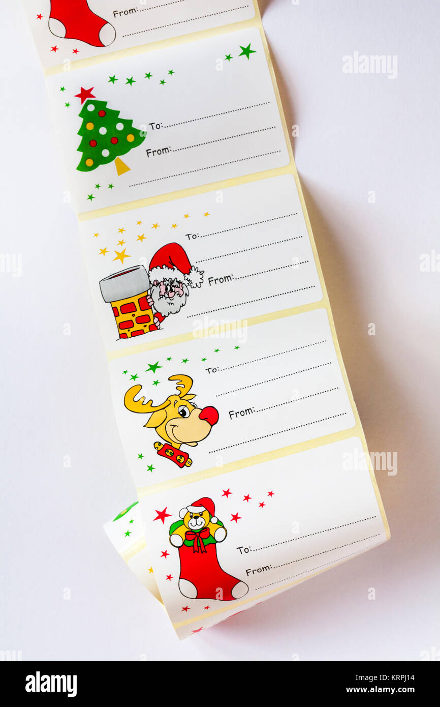 Christmas stickers ready to write and stick on gifts presents set on white background Stock Photo
