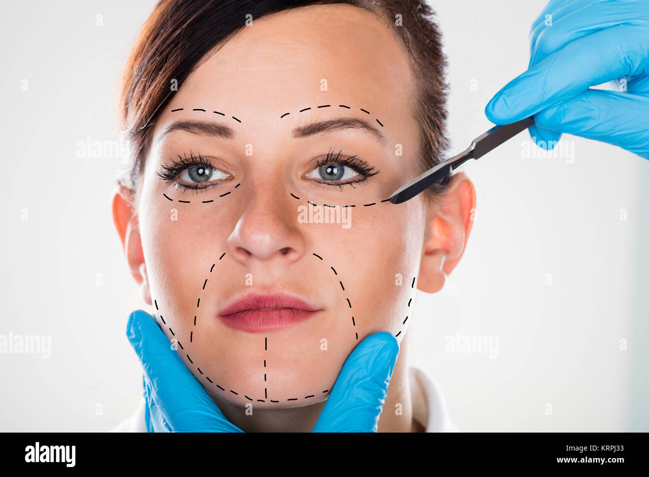Cosmetic Surgery With Scalpel On Young Woman Stock Photo Alamy