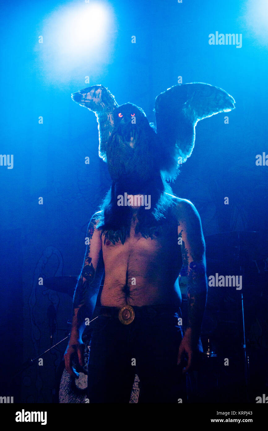 Kvelertak lead singer Erlend Hjelvik wears his famous owl outfit on stage  during the bands gig at Amager Bio in Copenhagen. Denmark 2013 Stock Photo  - Alamy