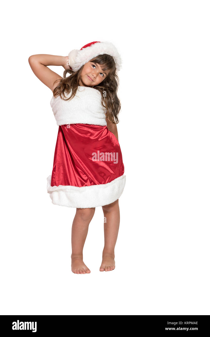 Long haired brunette little girl in Santa Claus costume Stock Photo