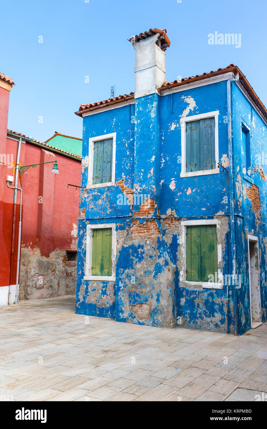 Old blue house with closed wooden shutters Stock Photo - Alamy