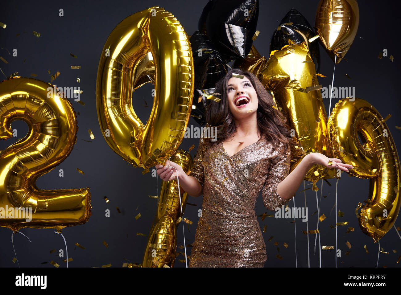 Cheerful woman enjoying at new year's party Stock Photo