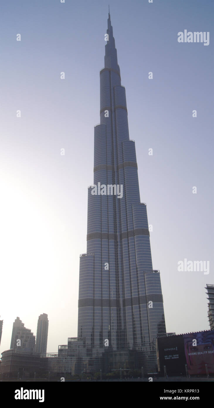 DUBAI, UNITED ARAB EMIRATES - MARCH 31st, 2014: Burj Khalifa, world's tallest tower in Downtown Burj Dubai next to the Dubai Mall Stock Photo