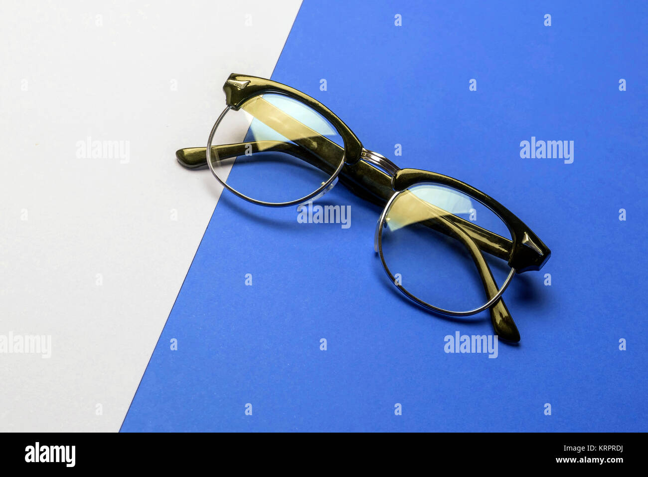 Vintage glasses on colorful background, conceptual image Stock Photo