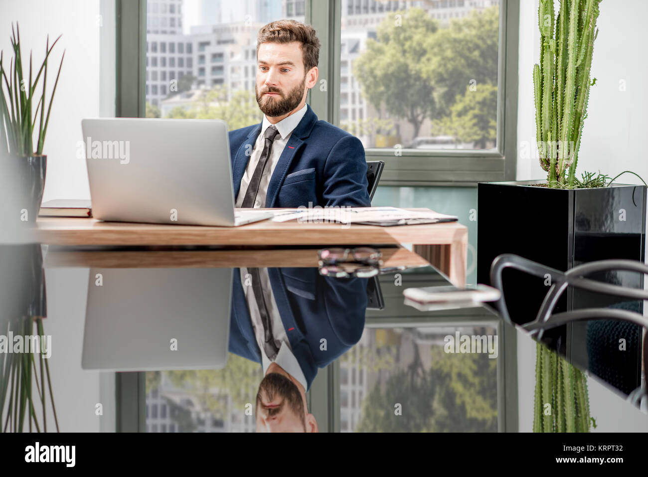 Banker working at the office Stock Photo