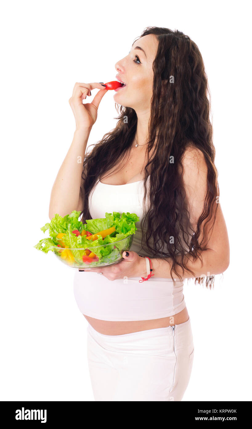 Pregnant woman eating salad Stock Photo Alamy