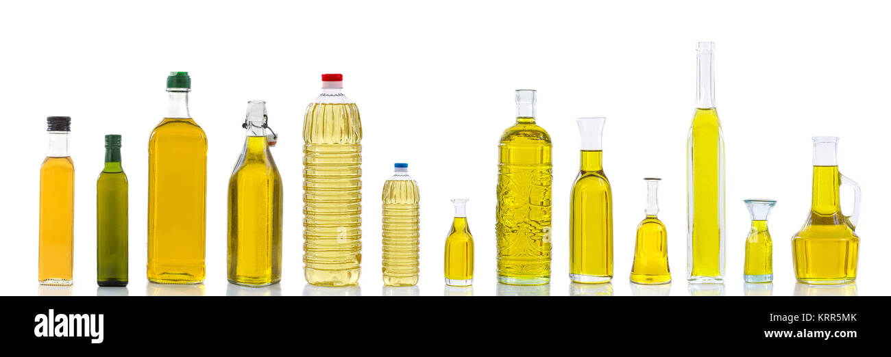 Set of different types of oil for cooking. Group bottles. Isolated on white Stock Photo