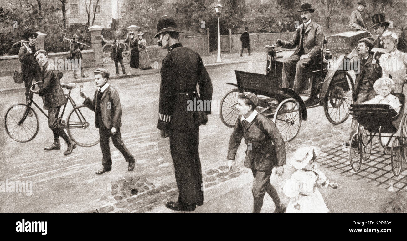 The Act of Parliament passed in 1896 which enabled motor cars to be used on British roads contained an irksome proviso which stipulated that each vehicle had to be preceded by a person carrying a red flag.  Seen here, a driver ironically employs a small boy to carry a minute red square. Stock Photo