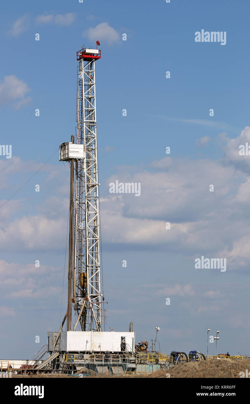 Oil drilling rig and mining equipment on oilfield Stock Photo Alamy