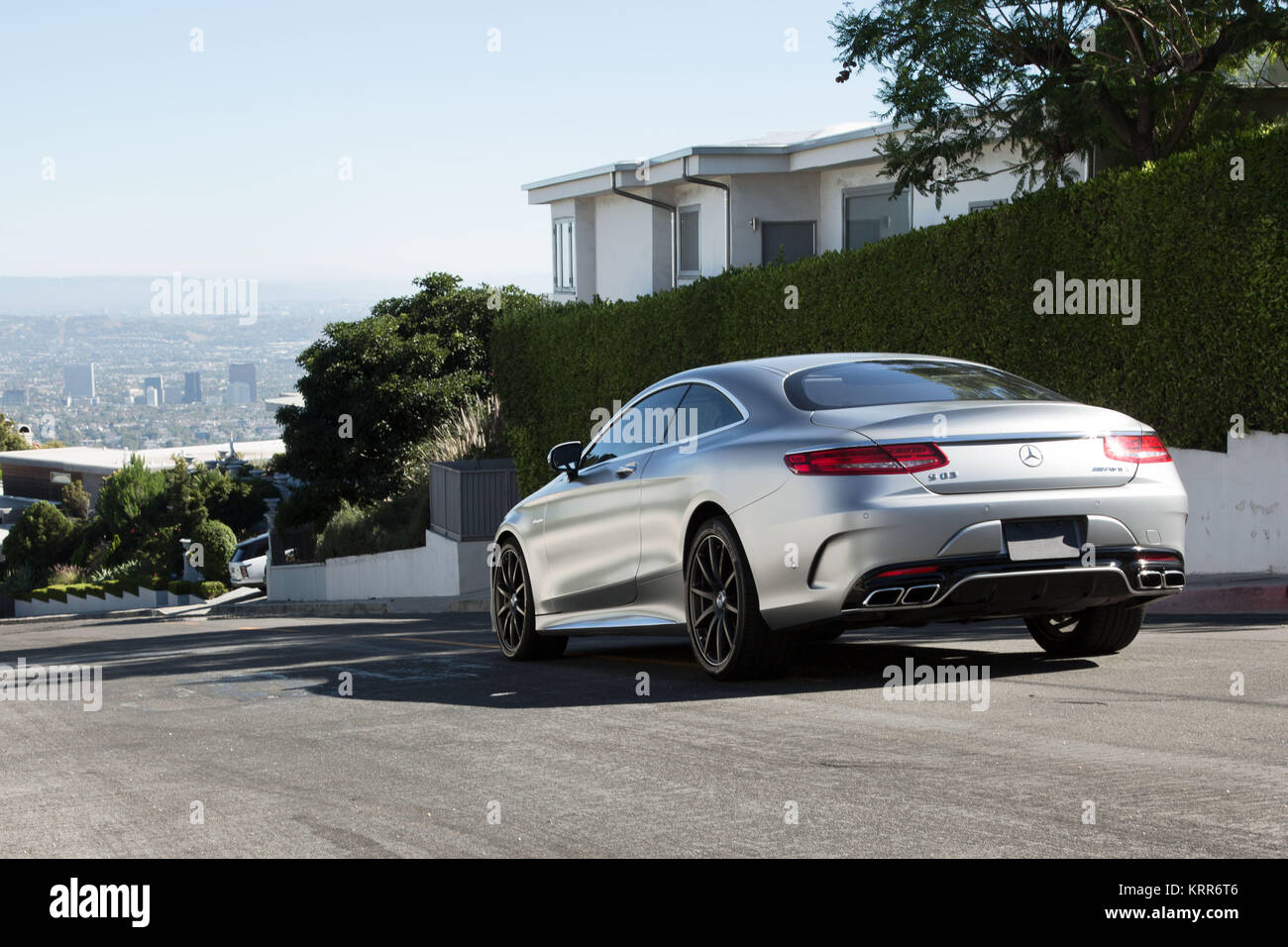 Mercedes S63 Coupe - Silver Exterior - Back/Left Side Stock Photo