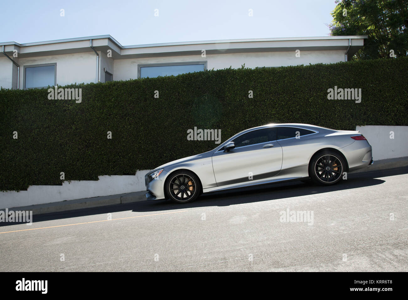 Mercedes S63 Coupe - Silver Exterior - Left Side Stock Photo