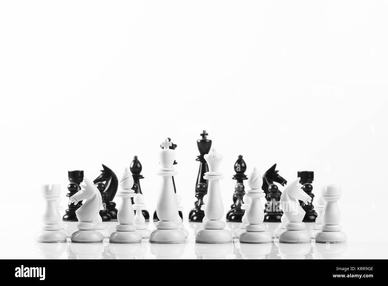 Chess pieces in starting position on a wooden Board Stock Photo by  ©Rostislavv 141334490