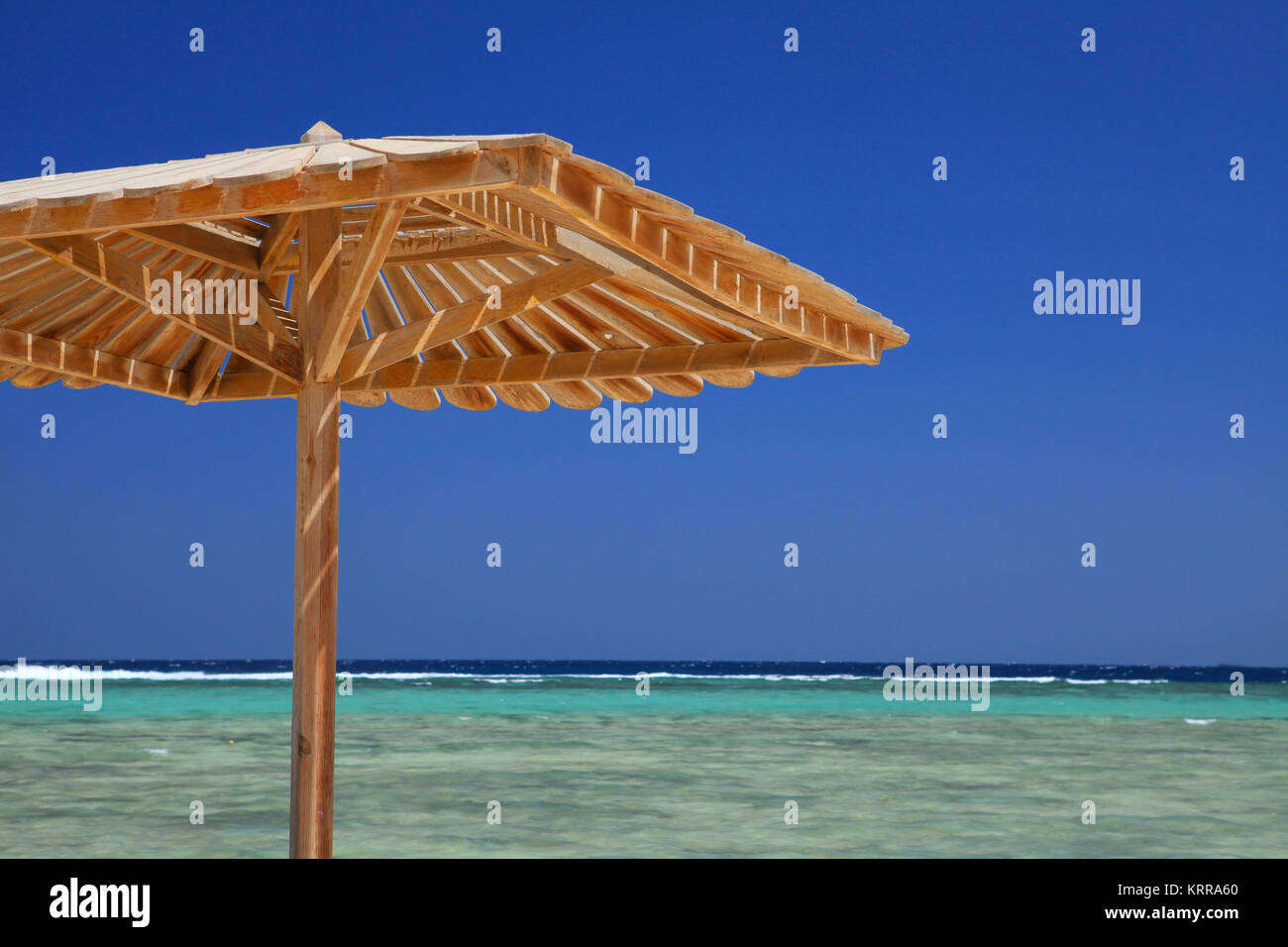 Egyptian parasol on the beach of Red Sea. Marsa Alam, Egypt. Stock Photo