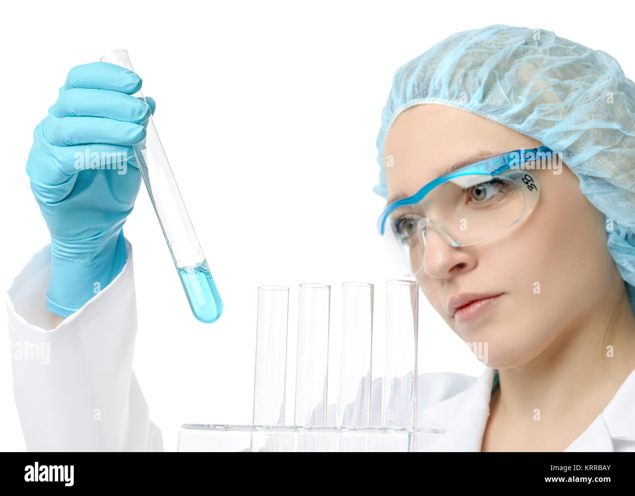 Liquid sample, chemical or biological, pipetted by a young female