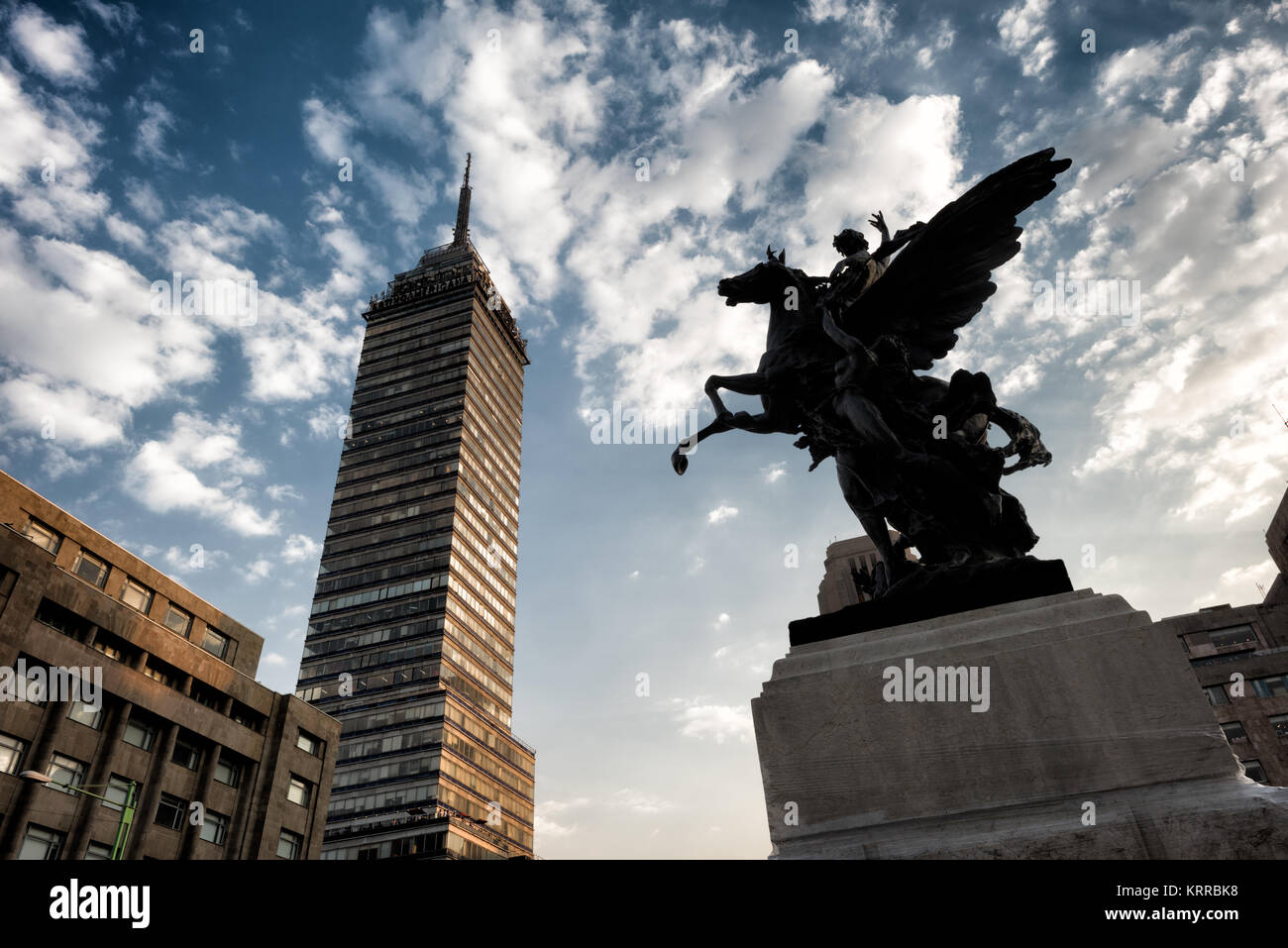Torre Latinoamericana towers above the Centro Historico district in Mexico City and is one of the area's major landmarks. It was the first major skyscraper built on the area known for high seismic activity. Stock Photo