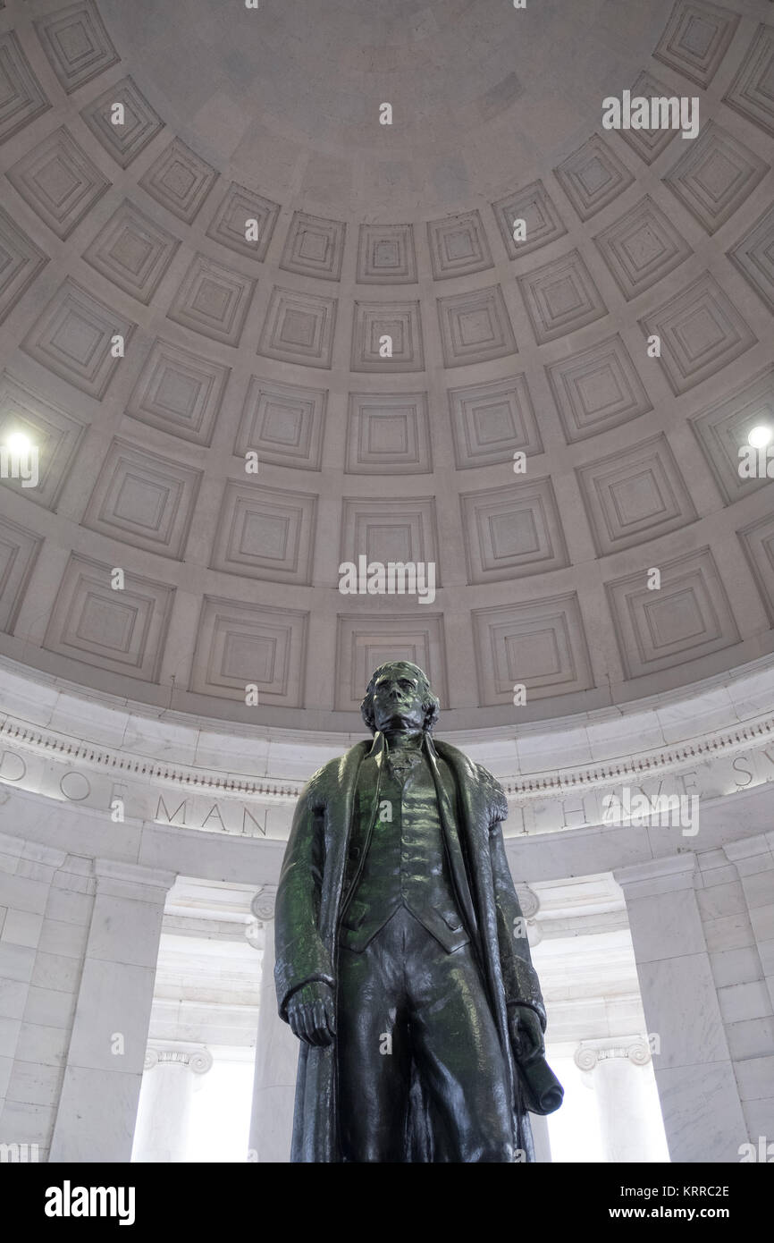 WASHINGTON DC - A statue of Thomas Jefferson by Rudulph Evans is the centerpiece of the Jefferson Memorial in Washington DC. It sits in the middle of the memorial under a large rotunda roof. Stock Photo