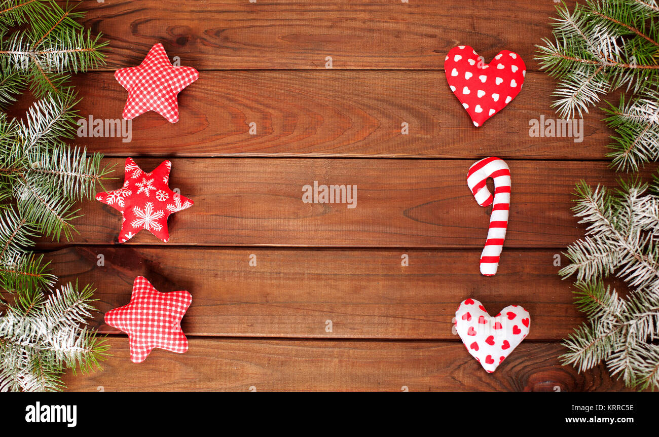 Fabric Christmas toys on a wood and Christmas tree background. Soft toy doll. Card. Christmas decorations Stock Photo - Alamy Fabric Christmas toys on a wood and Christmas tree background. Soft toy doll. Card. Christmas decorations Stock Photo - Alamy