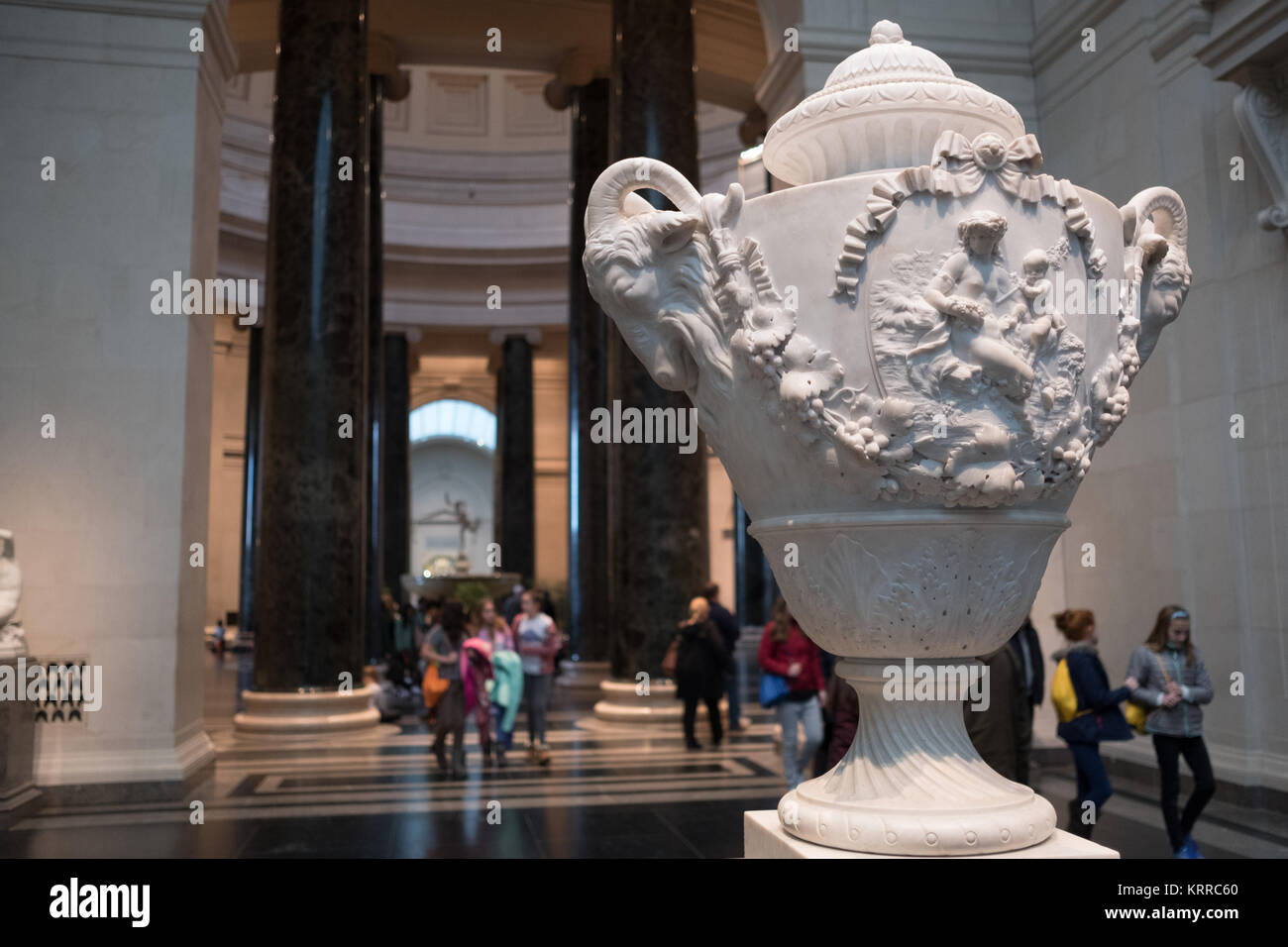 WASHINGTON DC, United States — A decorative urn on display in the main hall of the National Gallery of Art in Washington DC. The National Gallery of Art is renowned for its collection of European and American art, offering a comprehensive timeline of artistic development from the Middle Ages to the present day. Its esteemed status as a free public museum underscores its national significance and commitment to art education. Stock Photo