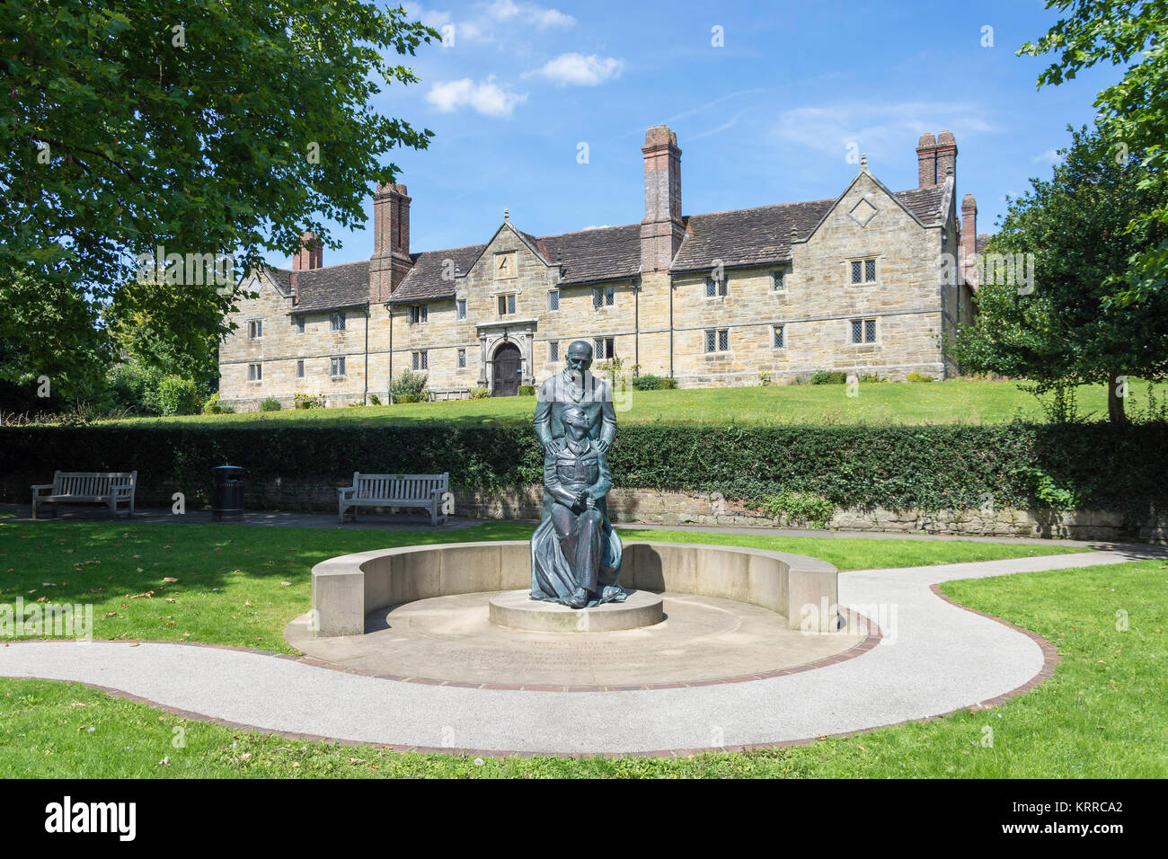 Sackville College and plastic surgeon Sir Archibald McIndoe statue, High Street, East Grinstead, West Sussex, England, United Kingdom Stock Photo