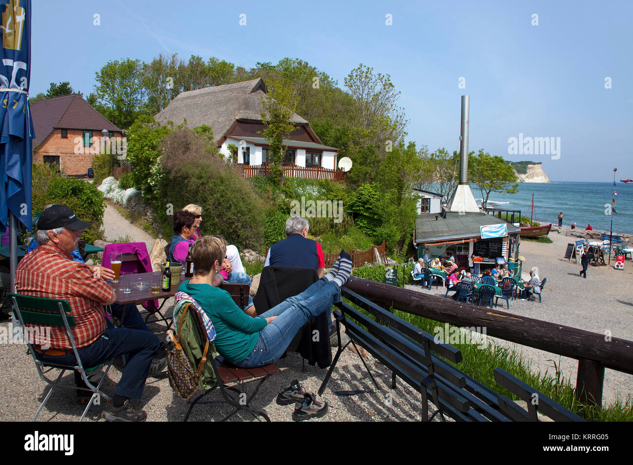 People at the beach of the village Vitt, Fish restaurant and Fish smoke house, Cape Arkona, North cape, Ruegen island, Germany, Europe Stock Photo