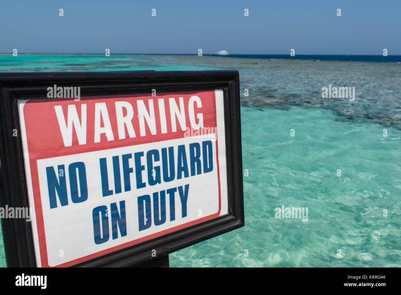 Warning sign, Somabay Breakers hotel waterway, Soma Bay, Hurghada, Safaga, Egypt. Stock Photo